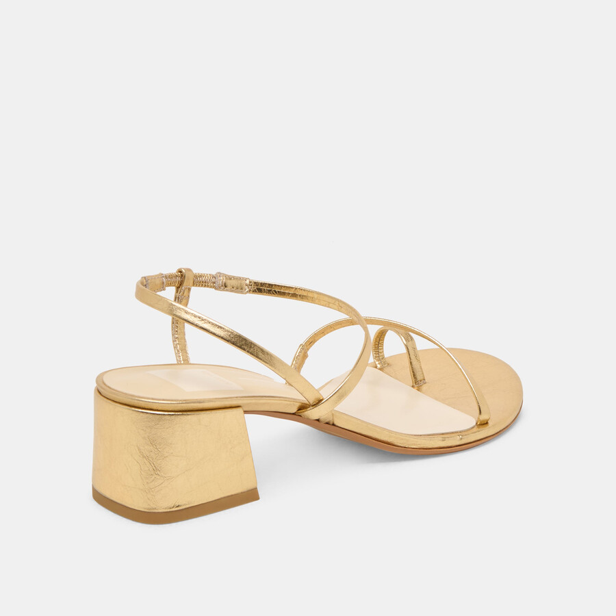 tacchi trini in pelle dorata